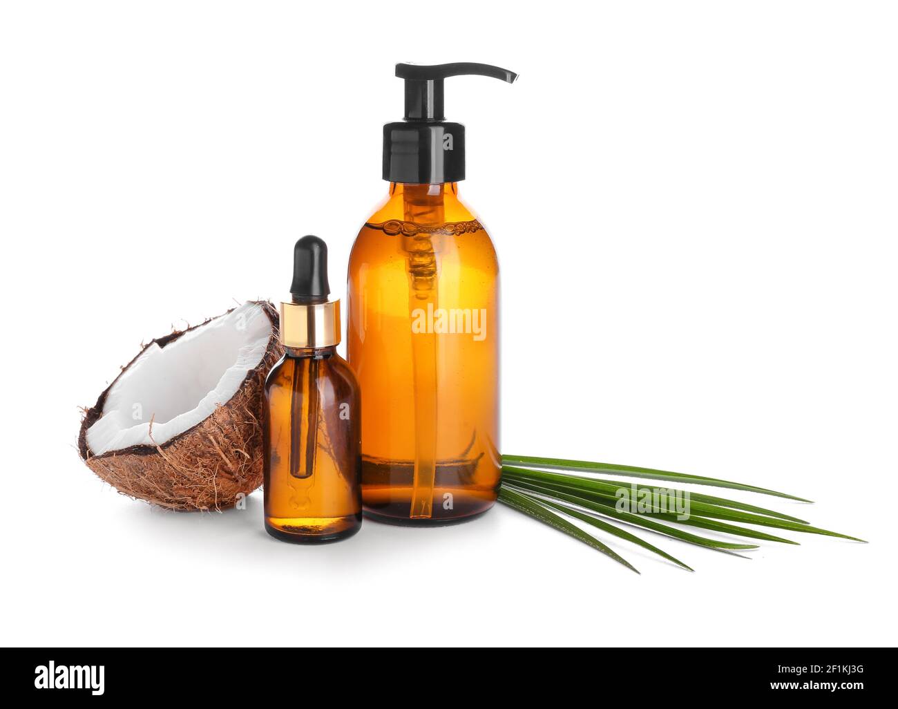 Bottles of coconut oil on white background Stock Photo Alamy