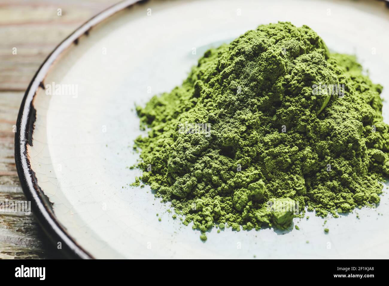 Matcha Powder Table Plate with powdered matcha tea, closeup Stock Photo - Alamy