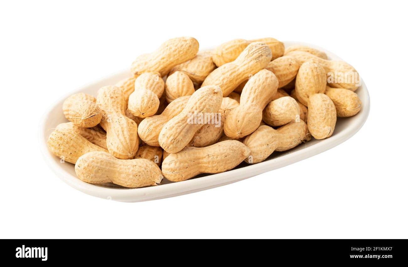 Shelled peanuts isolated on white background. Stock Photo