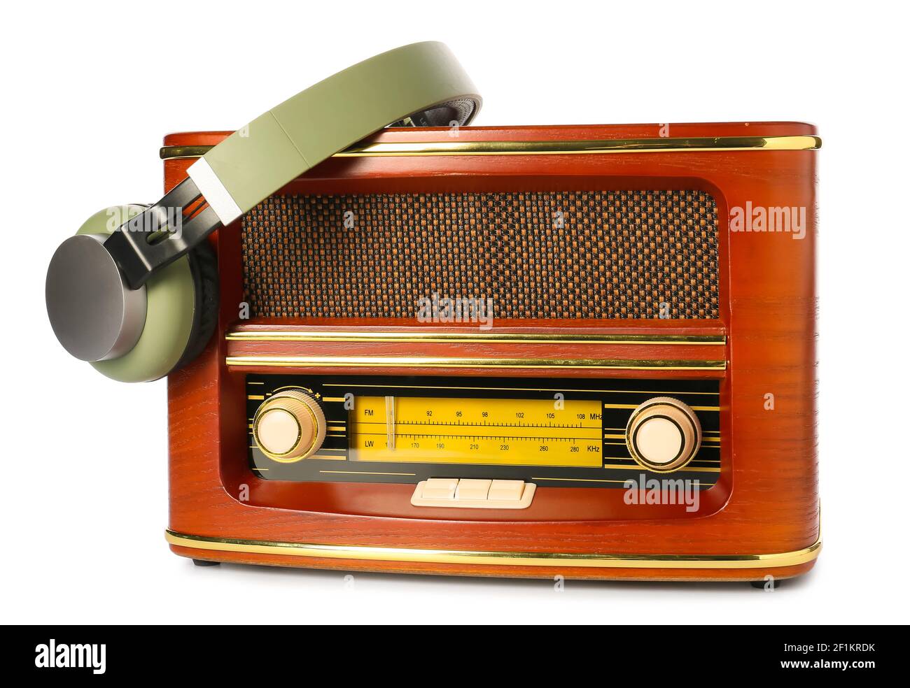 Retro radio receiver with headphones on white background Stock Photo ...
