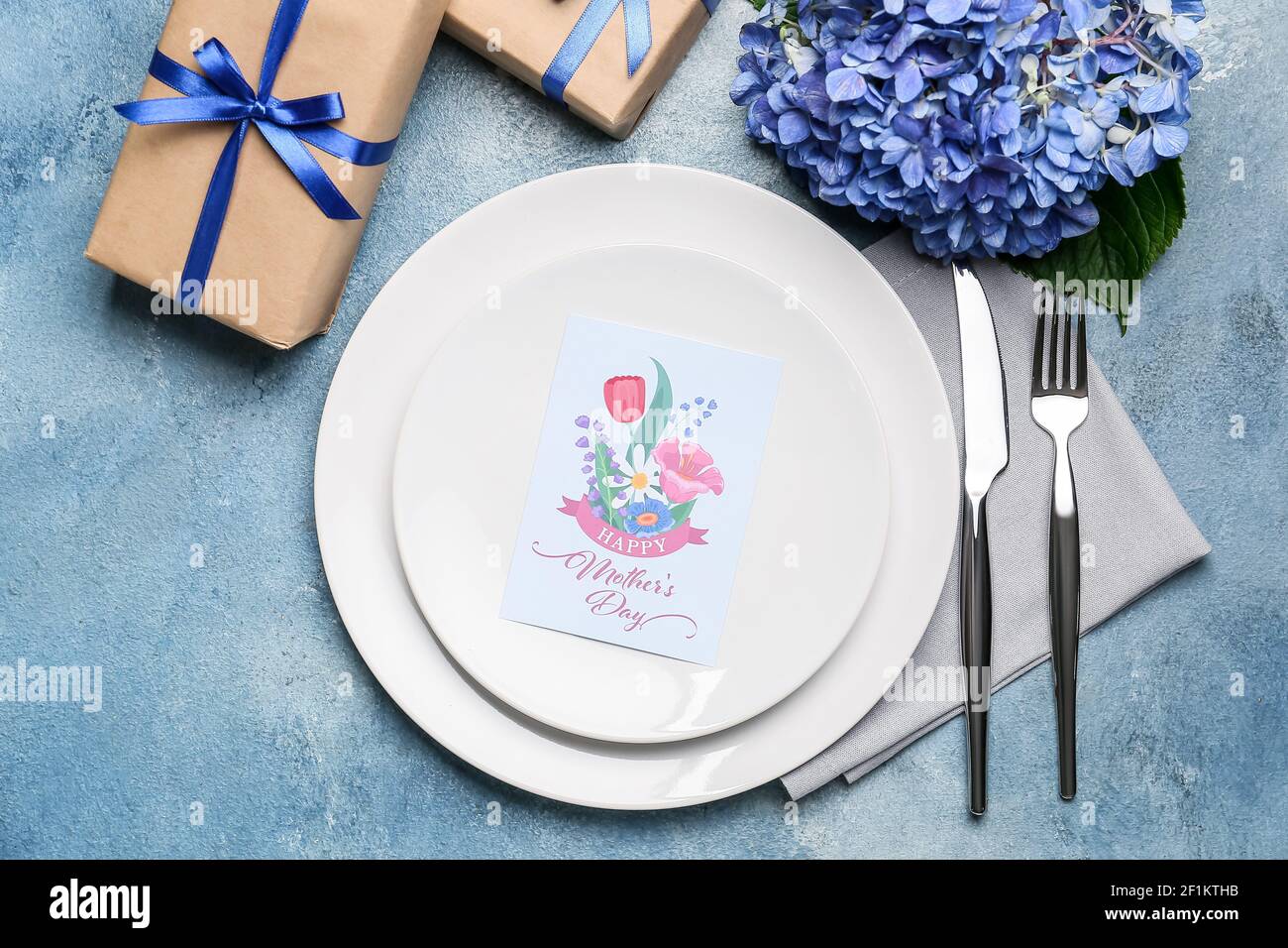 Beautiful table setting for Mother's Day on color background Stock ...