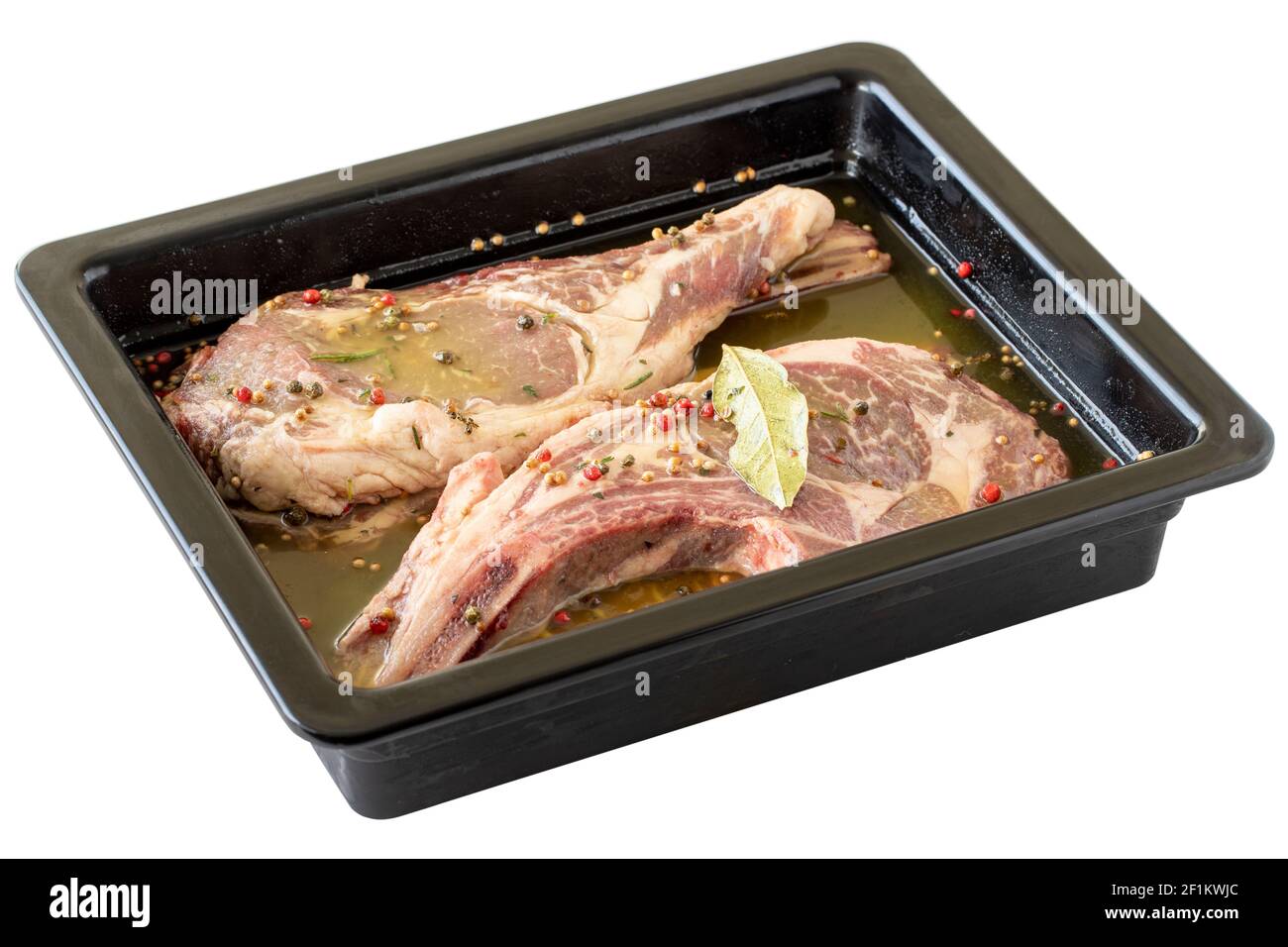 Marinated Raw veal chop isolated on white background Stock Photo Alamy