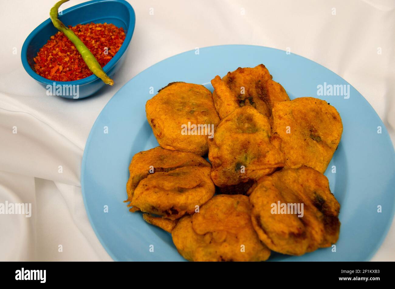 Batata Wada, famous Maharashtrian street food, Potatoes covered with