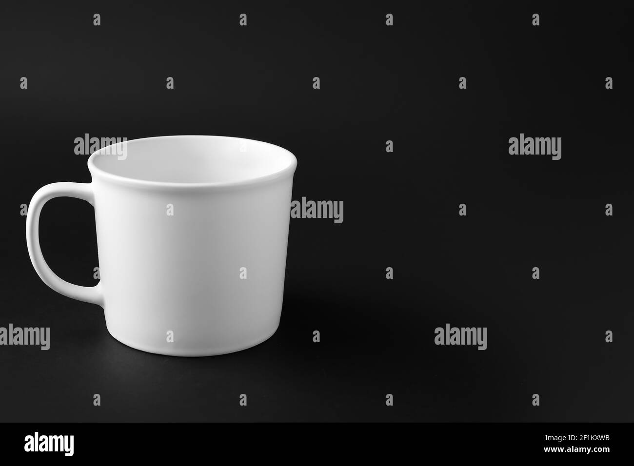 Empty Cup On Dark Background Stock Photo Alamy