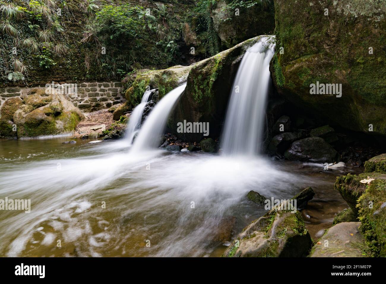 Idyllic little waterfall in mountain hi-res stock photography and ...
