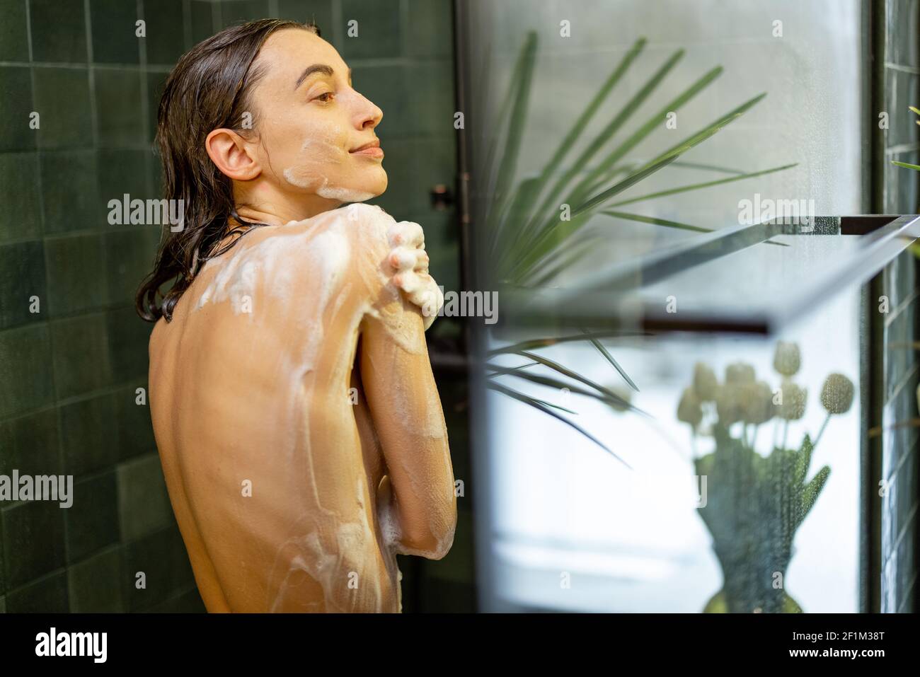 Pretty Woman Taking Shower And Soaping The Body With Shower Gel In Green Bathroom Beauty And Care Concept Copy Space Stock Photo Alamy