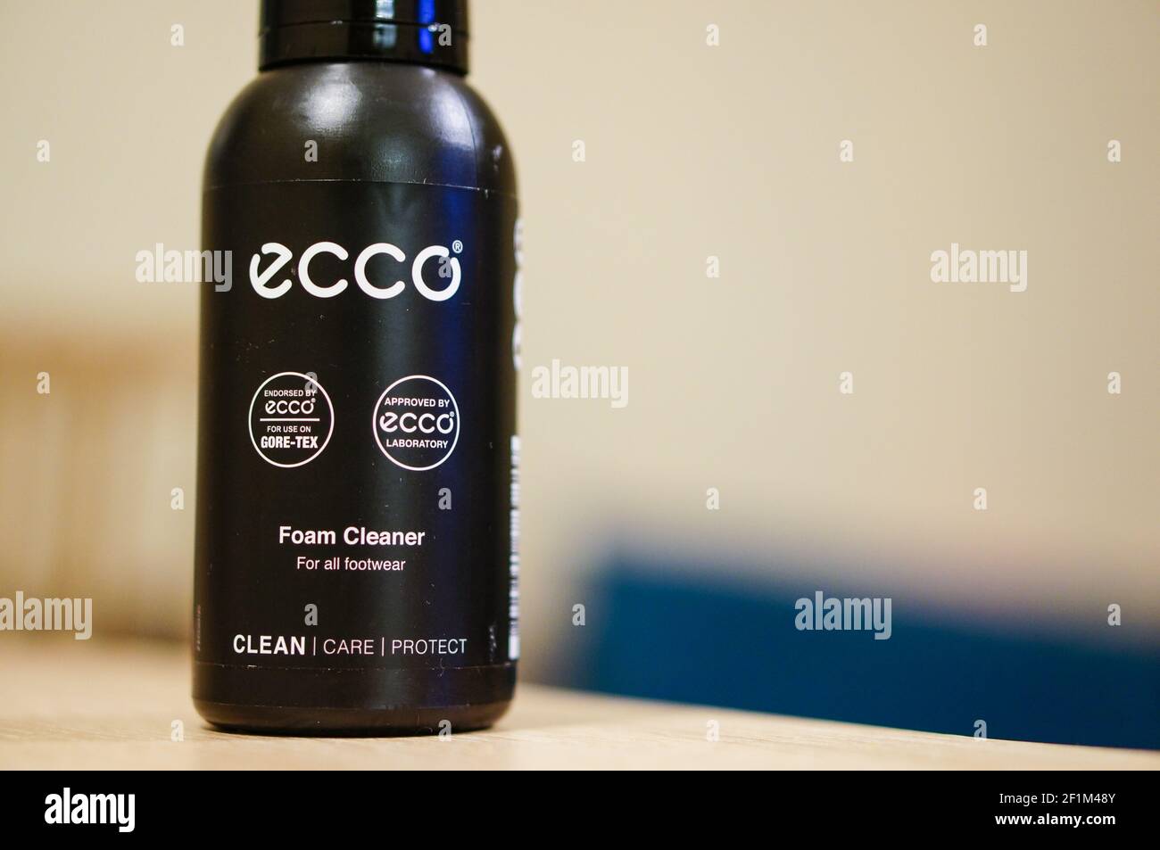 POZNAN, POLAND - Apr 05, 2016: Ecco shoe protection spray in a black bottle  on wooden table Stock Photo - Alamy