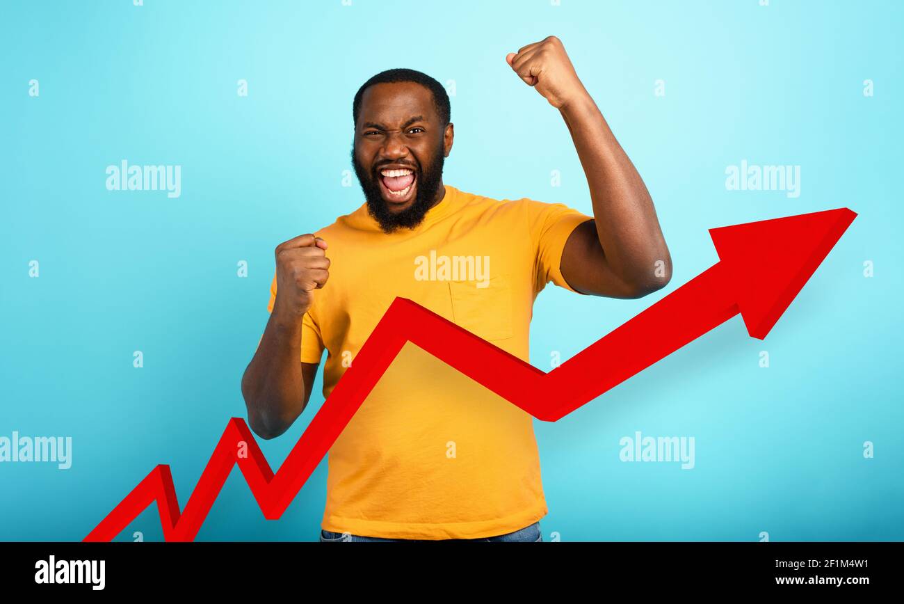 Man reaches the success with a positive trend of statistic. Cyan background Stock Photo