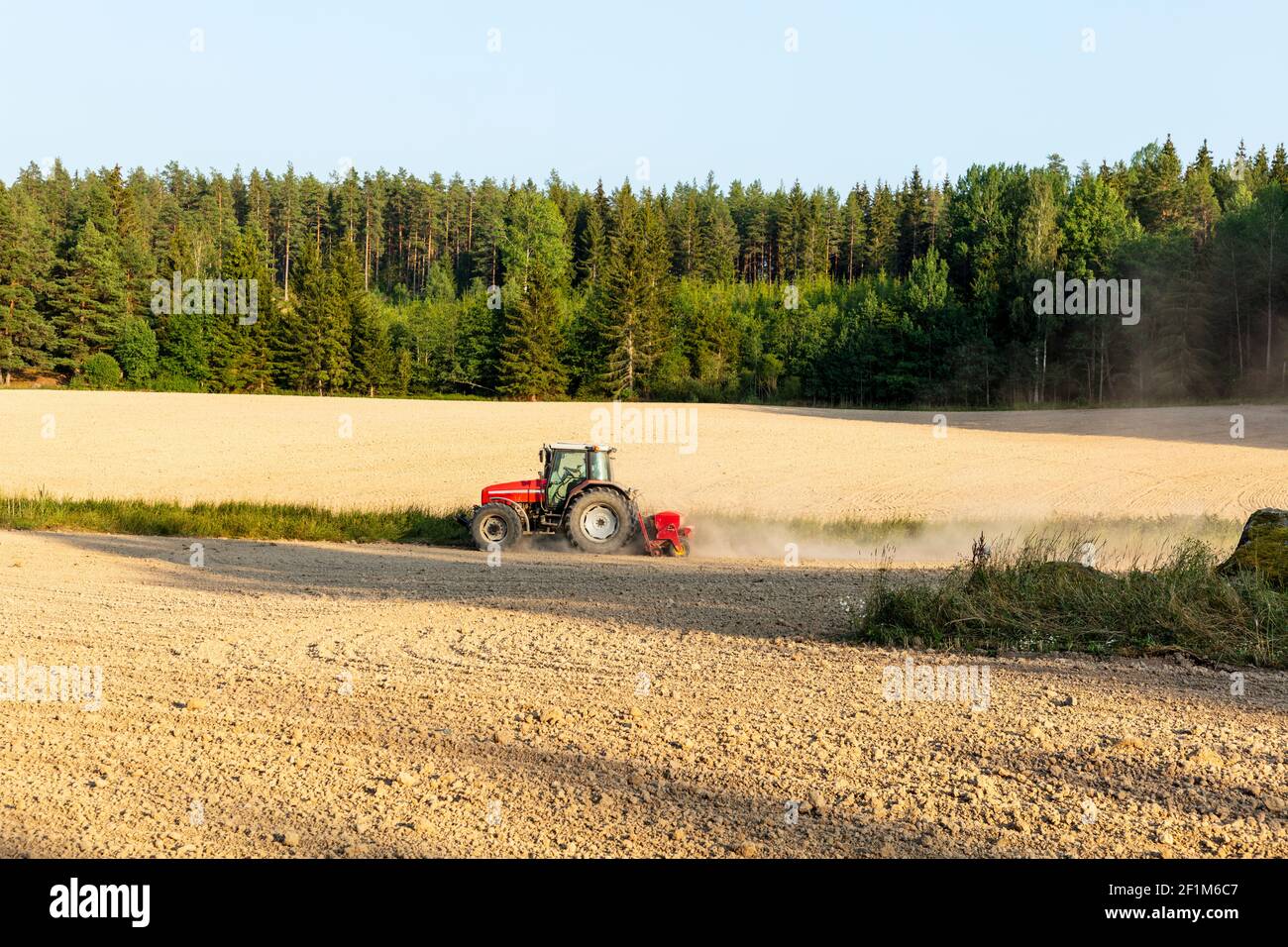Tractor in field Stock Photo