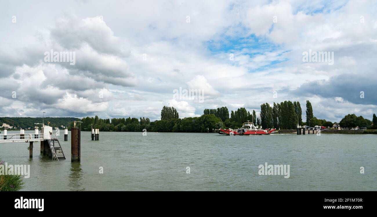 Car and truck ferry crossing the Seine River in Duclair in Upper Normandy Stock Photo
