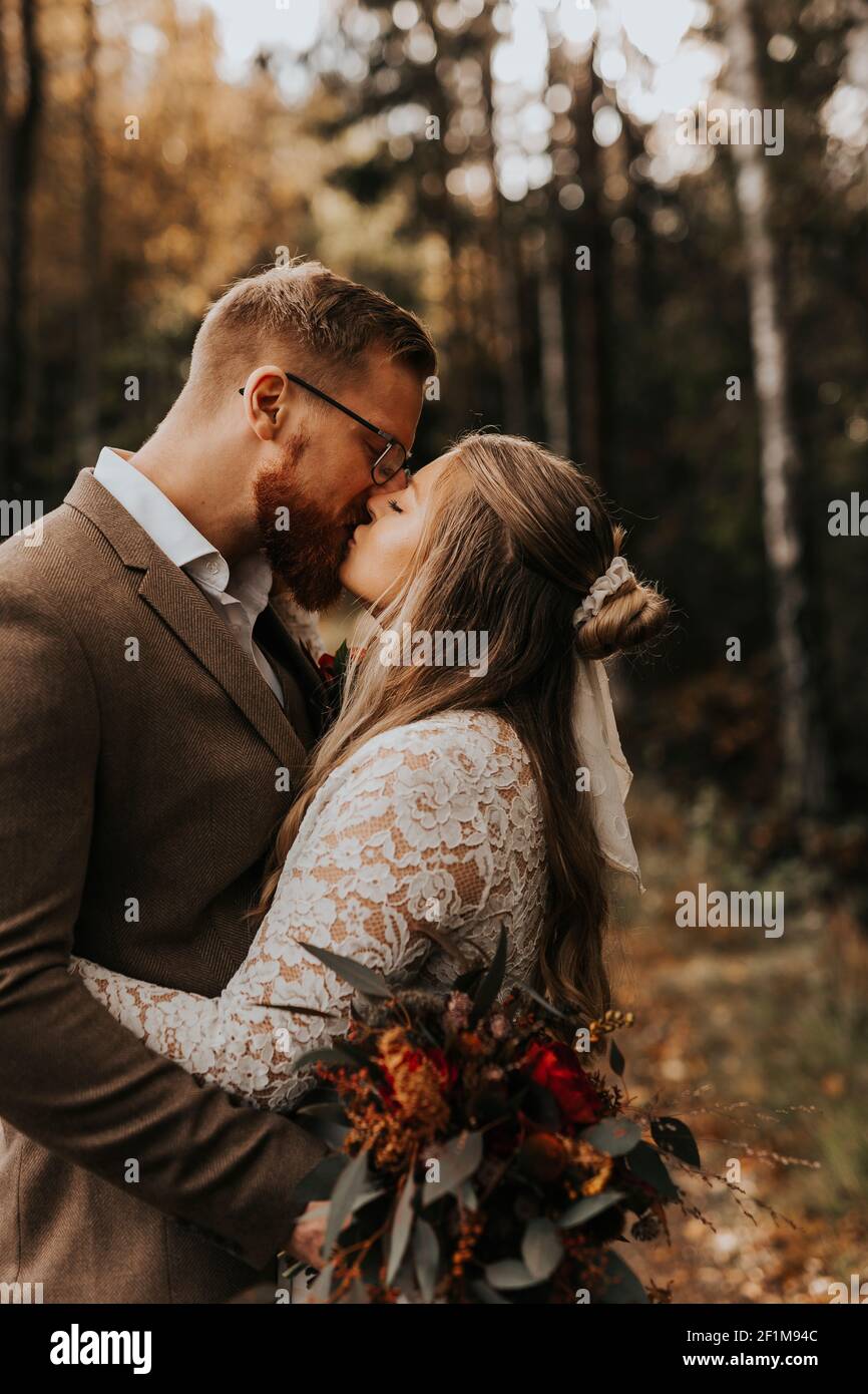 Bride and groom kissing Stock Photo