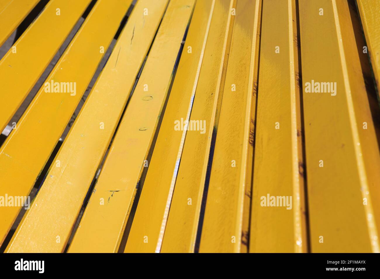 Yellow wooden bench Stock Photo Alamy