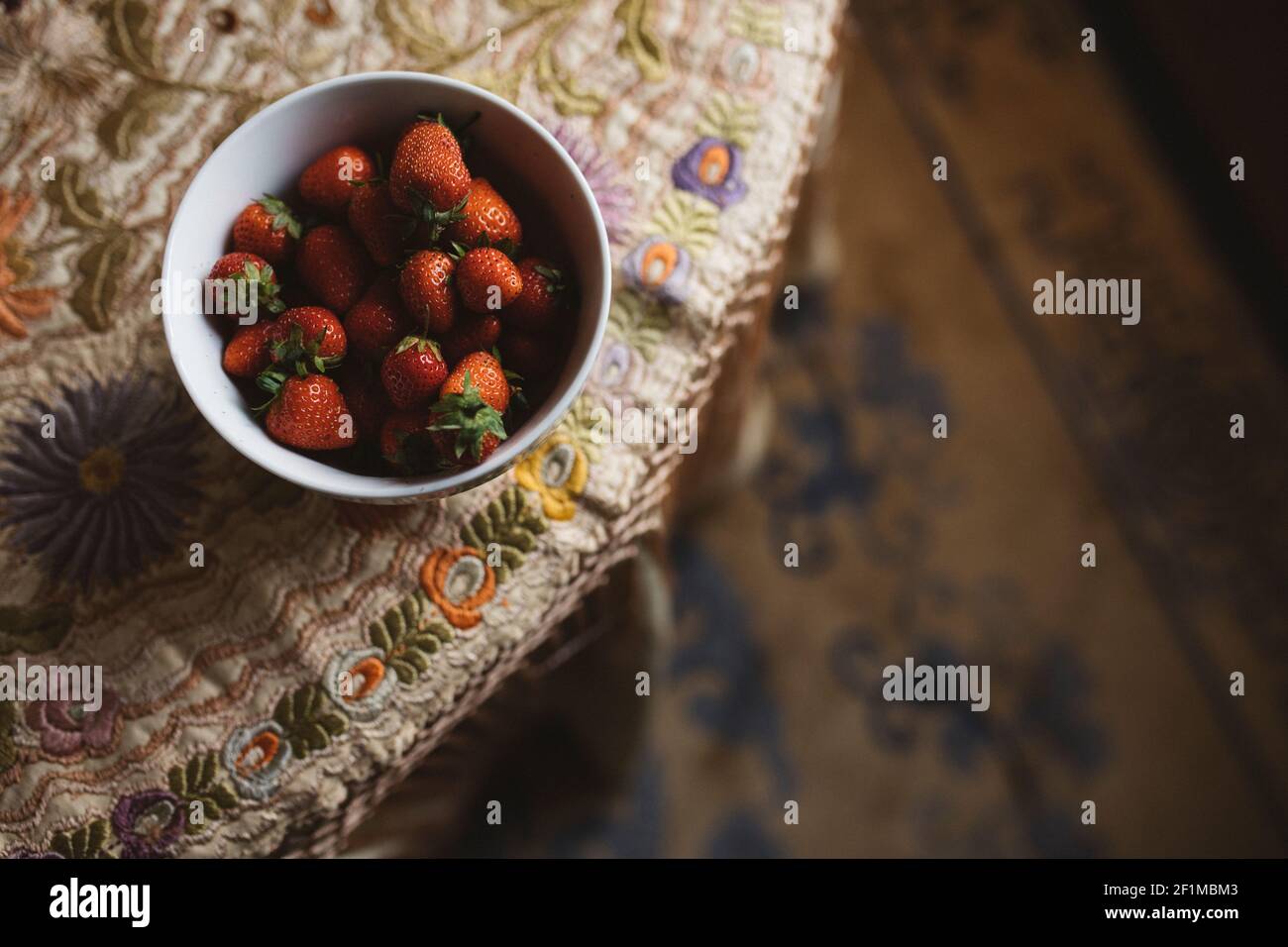 High angle view of strawberries in bowl Stock Photo