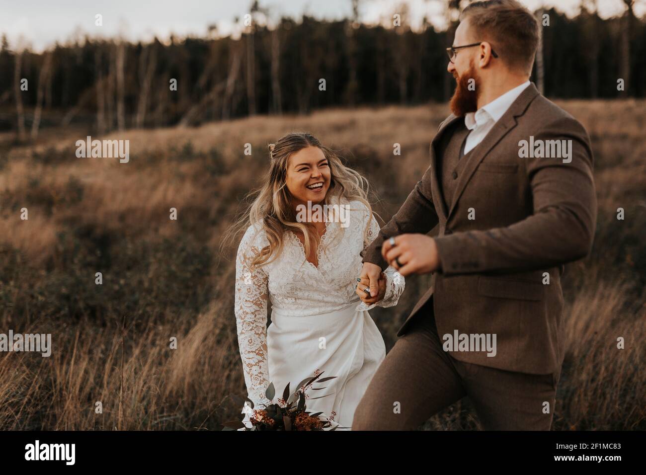 Happy bride and groom together Stock Photo