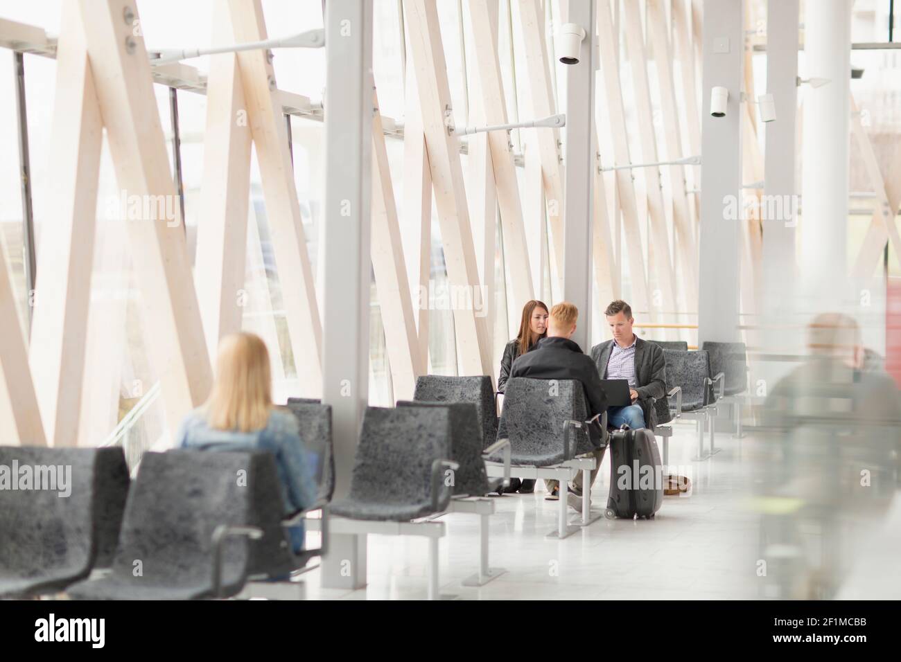 Woman airport waiting room hi-res stock photography and images - Alamy
