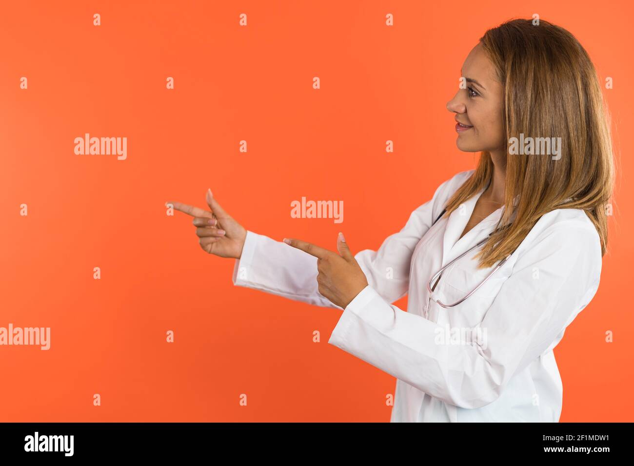 Doctor smiles camera hi-res stock photography and images - Alamy