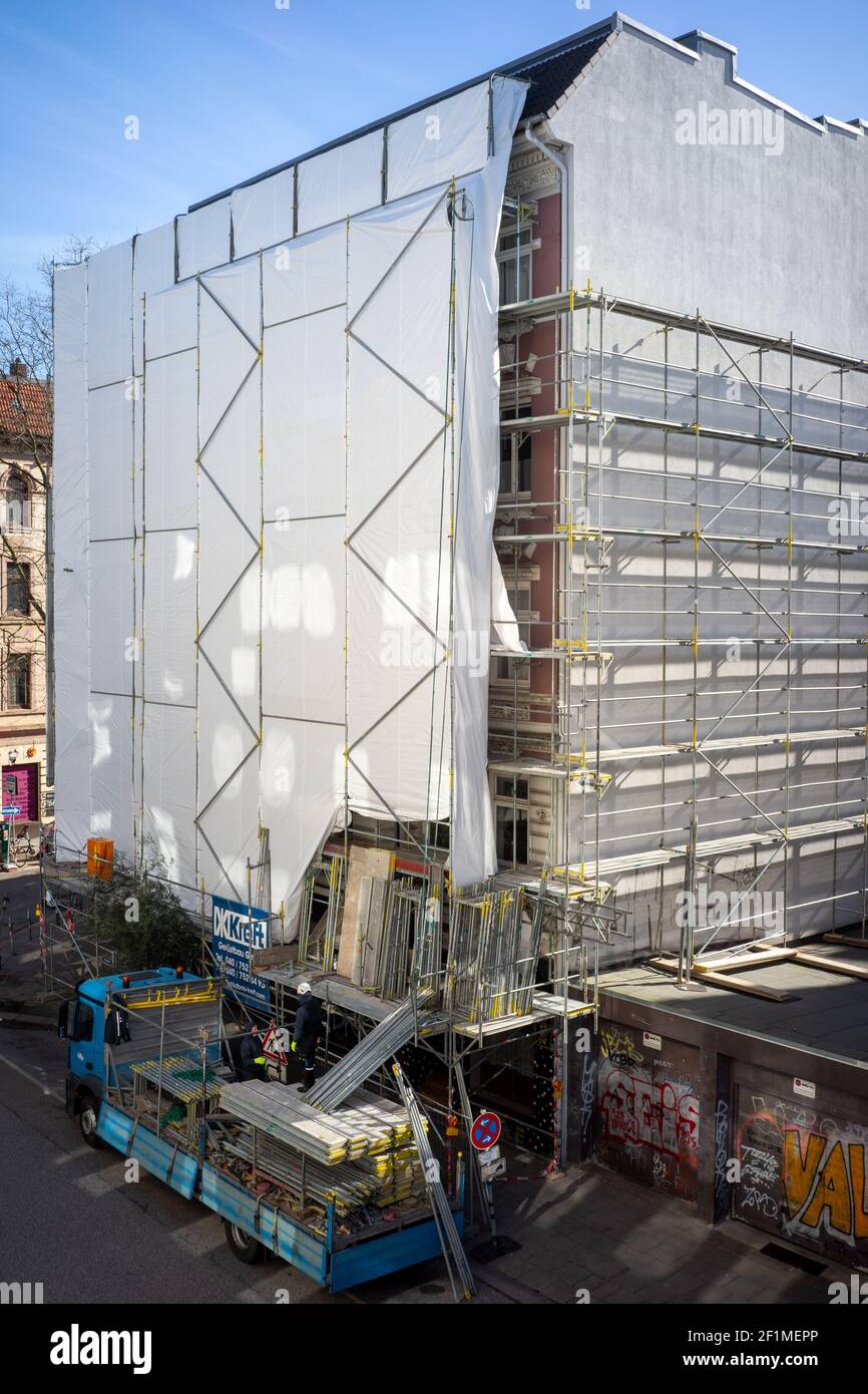 Old apartment building being scaffolded for upcoming construction work in St. Pauli district of Hamburg. Stock Photo