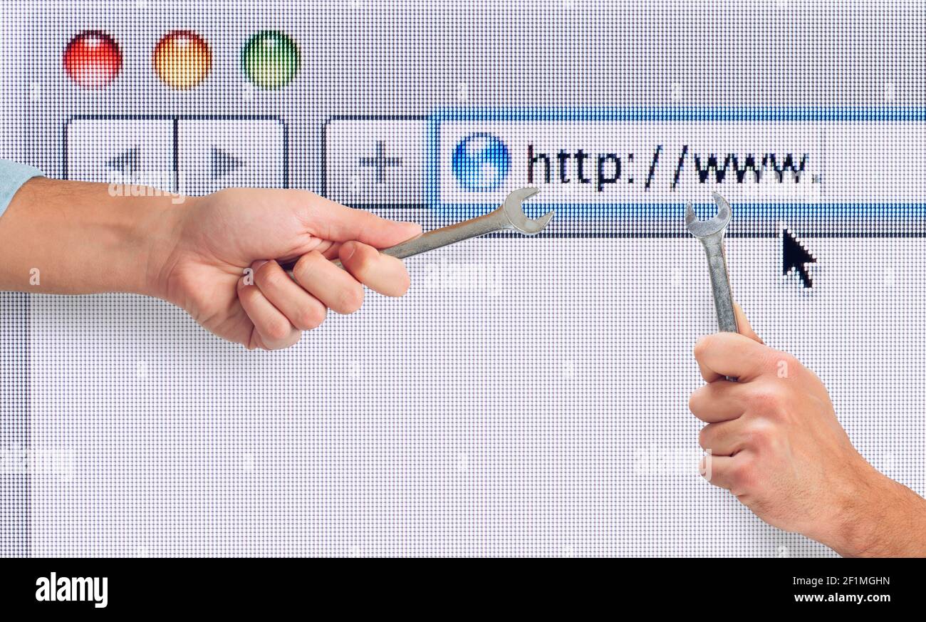 Hand with wrench over a internet web browser. concept of fix errors Stock Photo