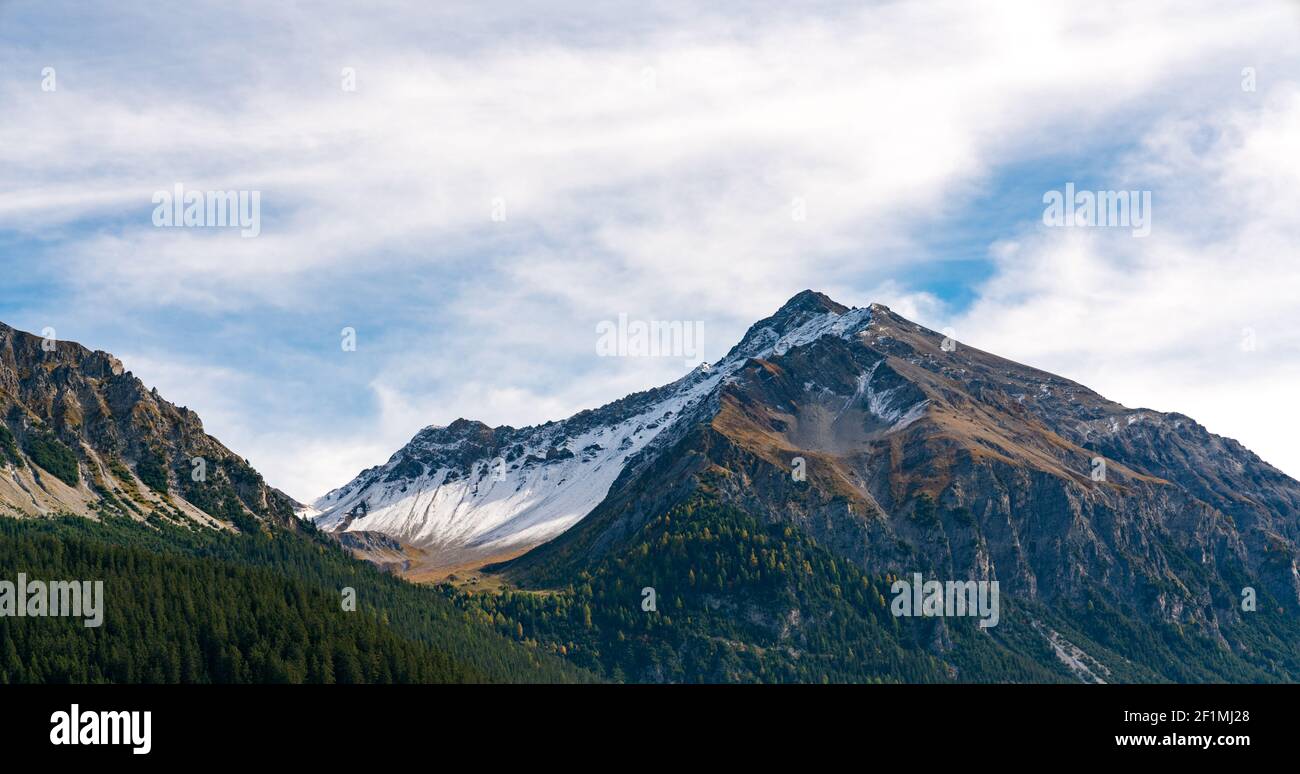 Mountain lake landscape in autumn with snowy peaks behind Stock Photo ...
