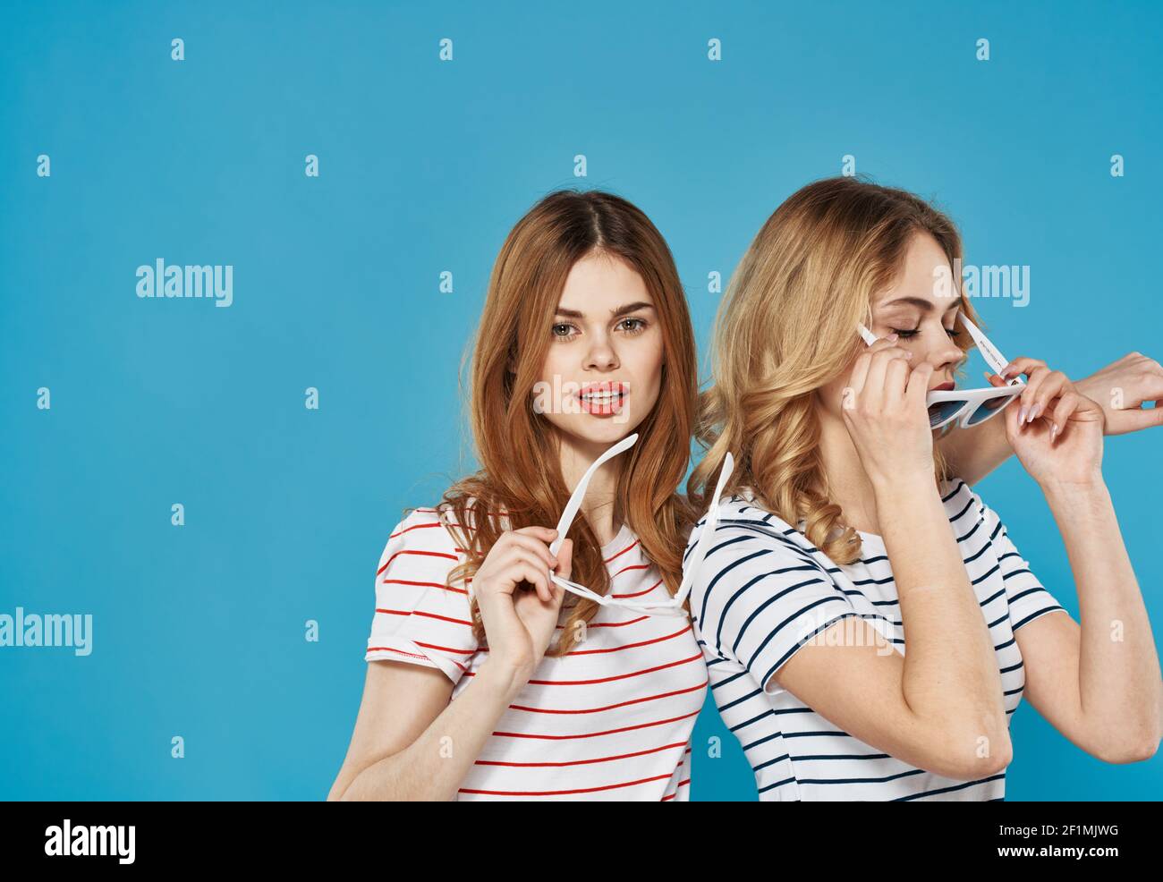 two mature women in trendy clothes 