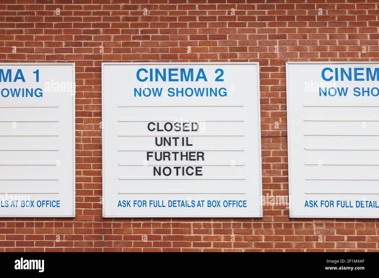 Closed Sign On Display Board Outside Cinema During Health Pandemic