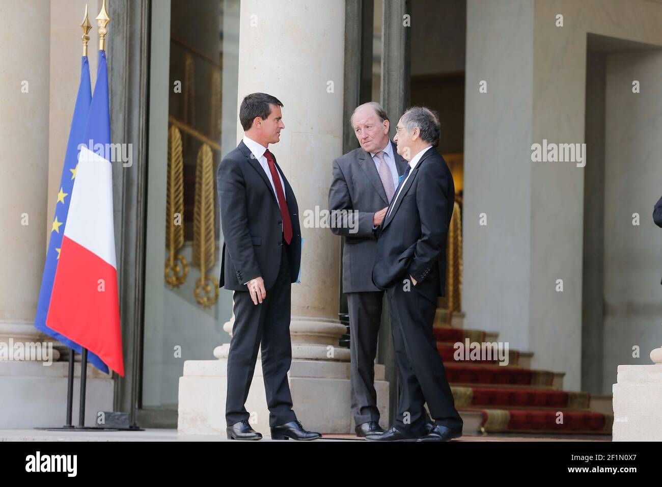 Manuel Valls, french Prime Minister, Jacques LAMBERT, Euro 2016 company CEO and Noel Le Graet, French Football Federation president chat at the Elysee after a pre-Euro 2016 official lunch, in Paris, France, on September 11, 2014 - Photo Stephane Allaman / DPPI Stock Photo