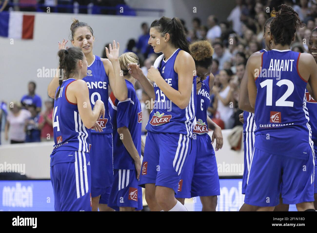 ANAEL LARDY, ANA MARIA CATA-CHITIGA and HELENA CIAK of France celebrate  after winning the 2014 Paris Tournament basketball match between France and  USA on September 21, 2014 at Pierre de Coubertin stadium