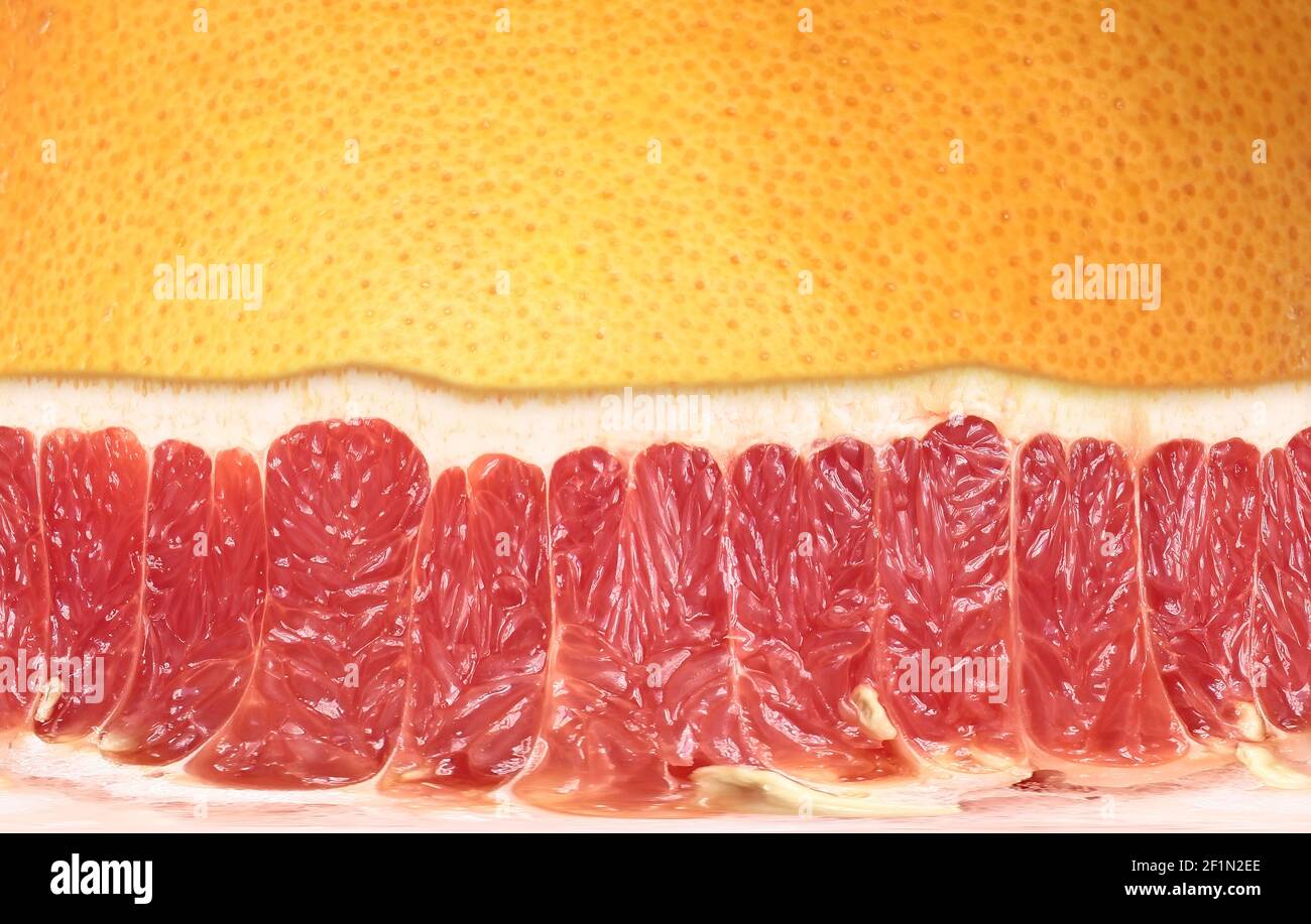 Flat sliced texture of grapefruit fruit. Stock Photo