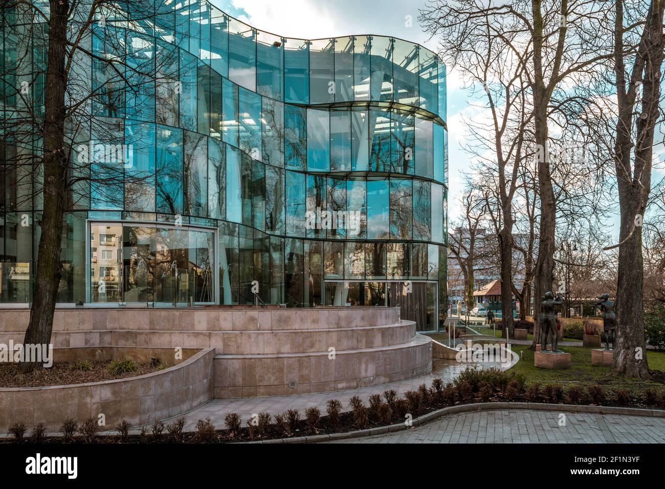 OPOLE, POLAND - Mar 06, 2021: a beautiful and modern building of the Philharmonic in Opole made entirely of glass Stock Photo