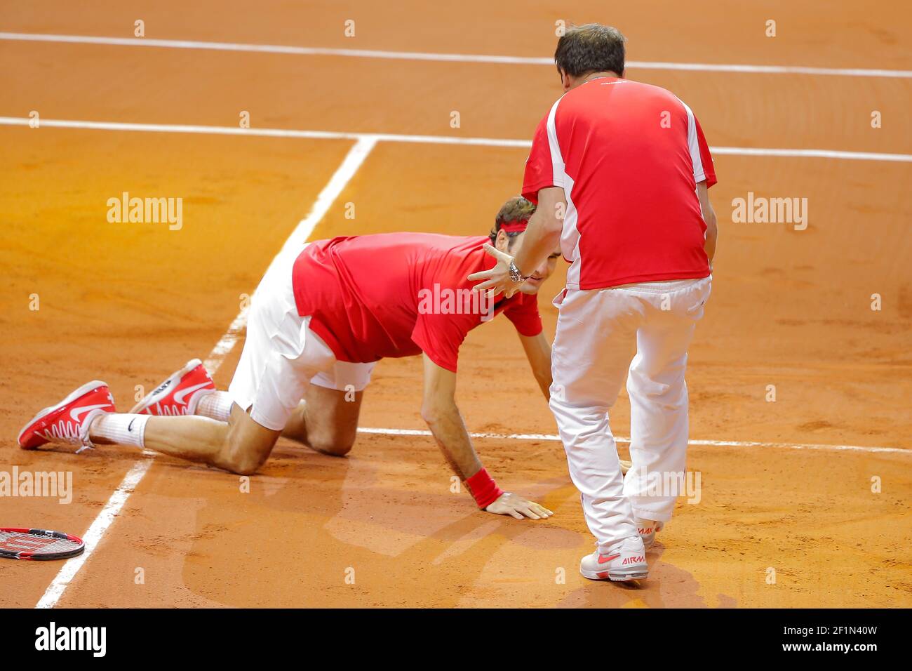 Roger Federer (SUI) and Swiss Captain Severin Luthi celebrated the victory  during the Tennis Davis Cup 2014, World Group Final, France v Switzerland,  day 3, on November 23, 2014 at Stade Pierre