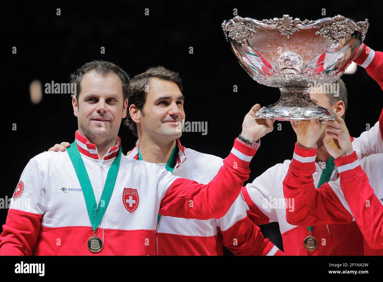 Roger Federer (SUI) had a look to the Davis Cup trophy behind his captain  Severin Luthi (SUI) during the Tennis Davis Cup 2014, World Group Final,  France v Switzerland, day 3, on