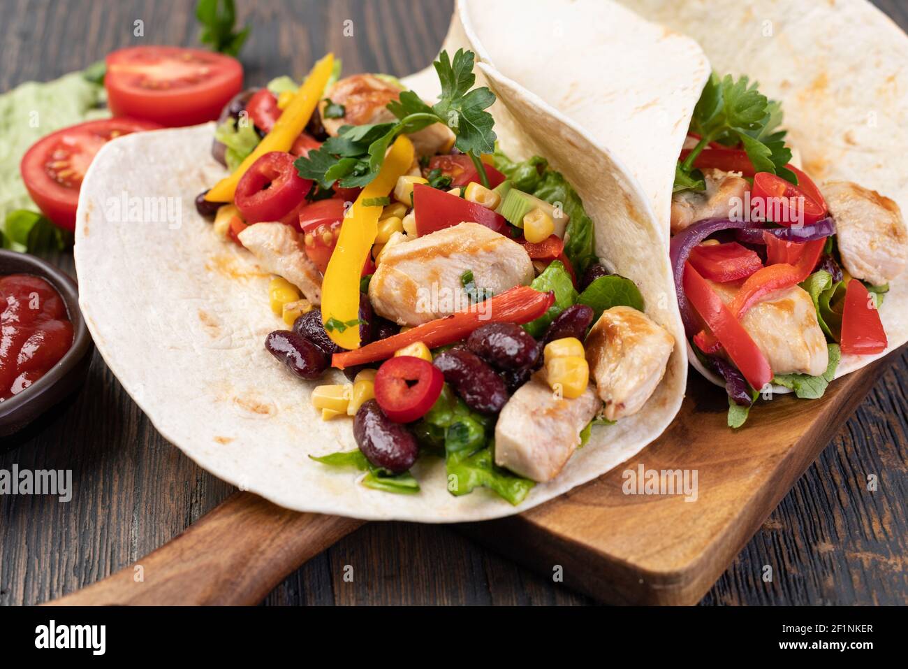 Burrito with vegetables and tortilla Stock Photo