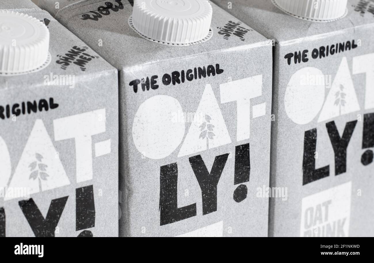 London / UK - March 8th 2021 - Oatly milk cartons macro closeup. Oatly is a dairy free vegan milk alternative. Stock Photo