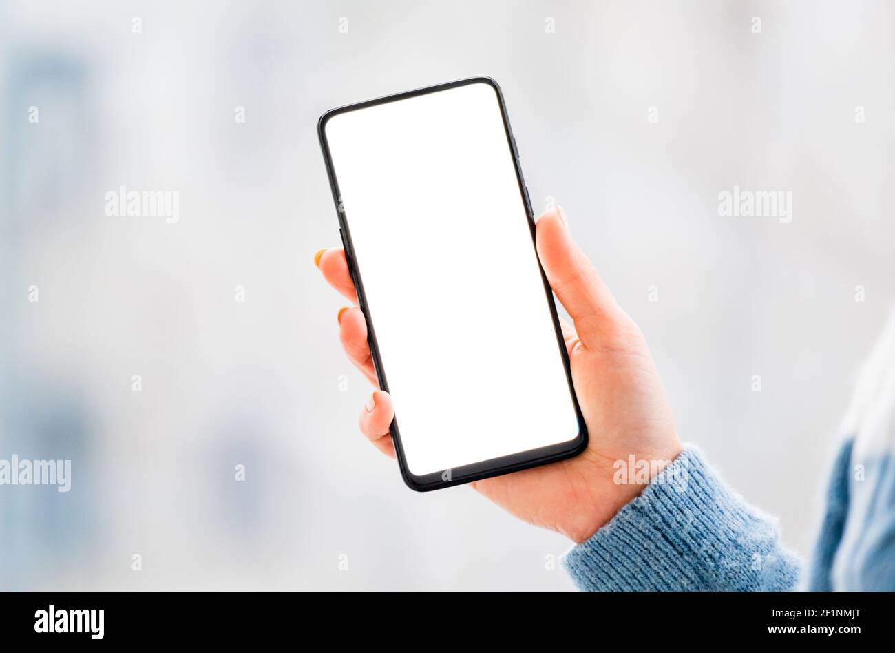 Hands working on mobile phone close up Stock Photo