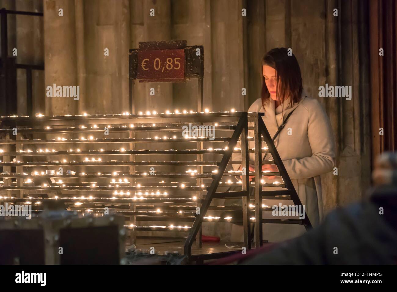 Woman praying candles hires stock photography and images Alamy