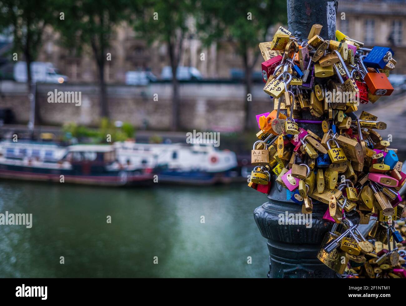Lovers padlocks attached to the Pont des Arts bridge in Paris France
