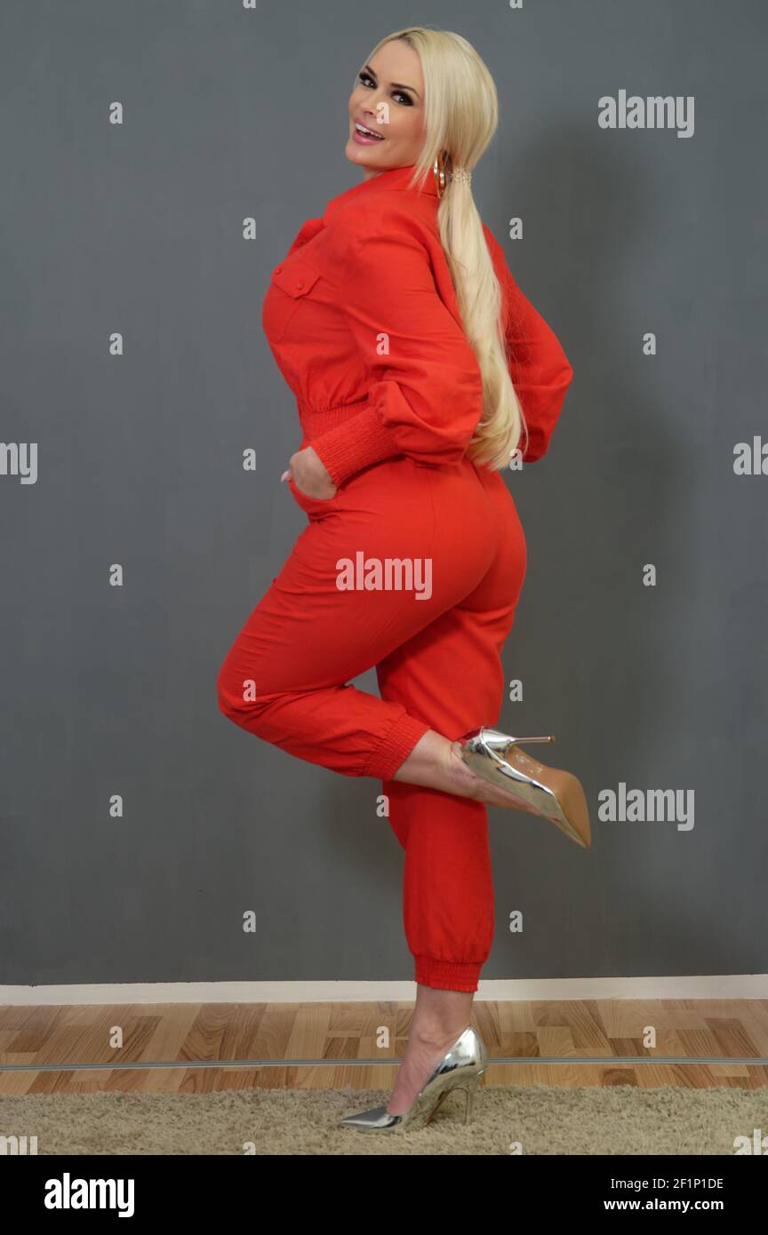Cologne, Germany. 09th Mar, 2021. Reality show actress Daniela Katzenberger looks at the camera during a photo shoot. Credit: Henning Kaiser/dpa/Alamy Live News Stock Photo