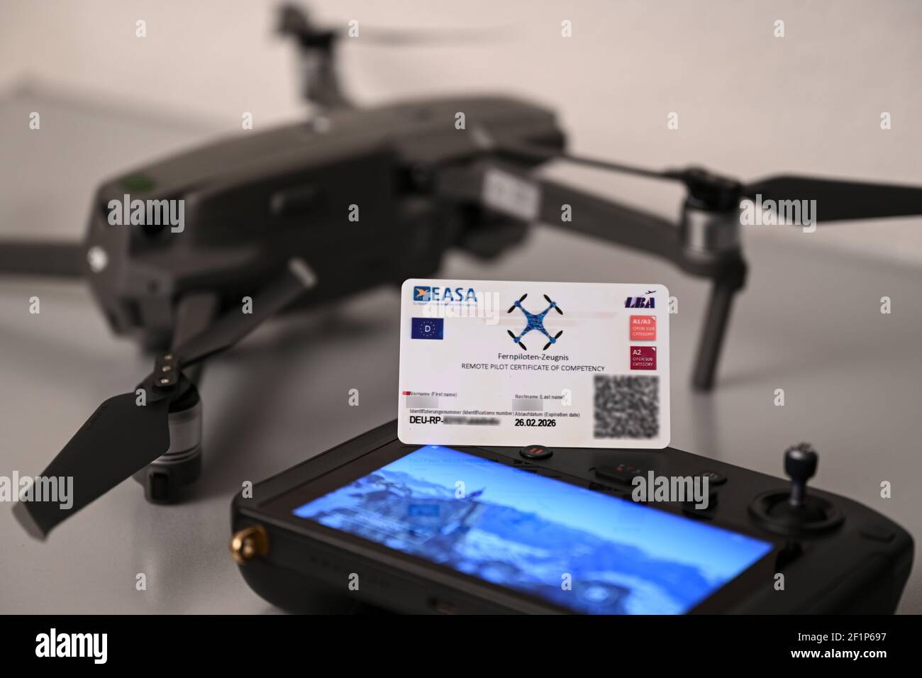 Ravensburg, Germany. 07th Mar, 2021. An EU Remote Pilot Certificate A2 lies  next to a drone. The EU Remote Pilot Certificate is also called a large drone  licence. The EU Remote Pilot