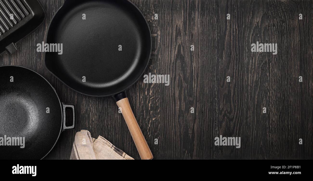Empty cast iron frying pan. Top view with copy space Stock Photo