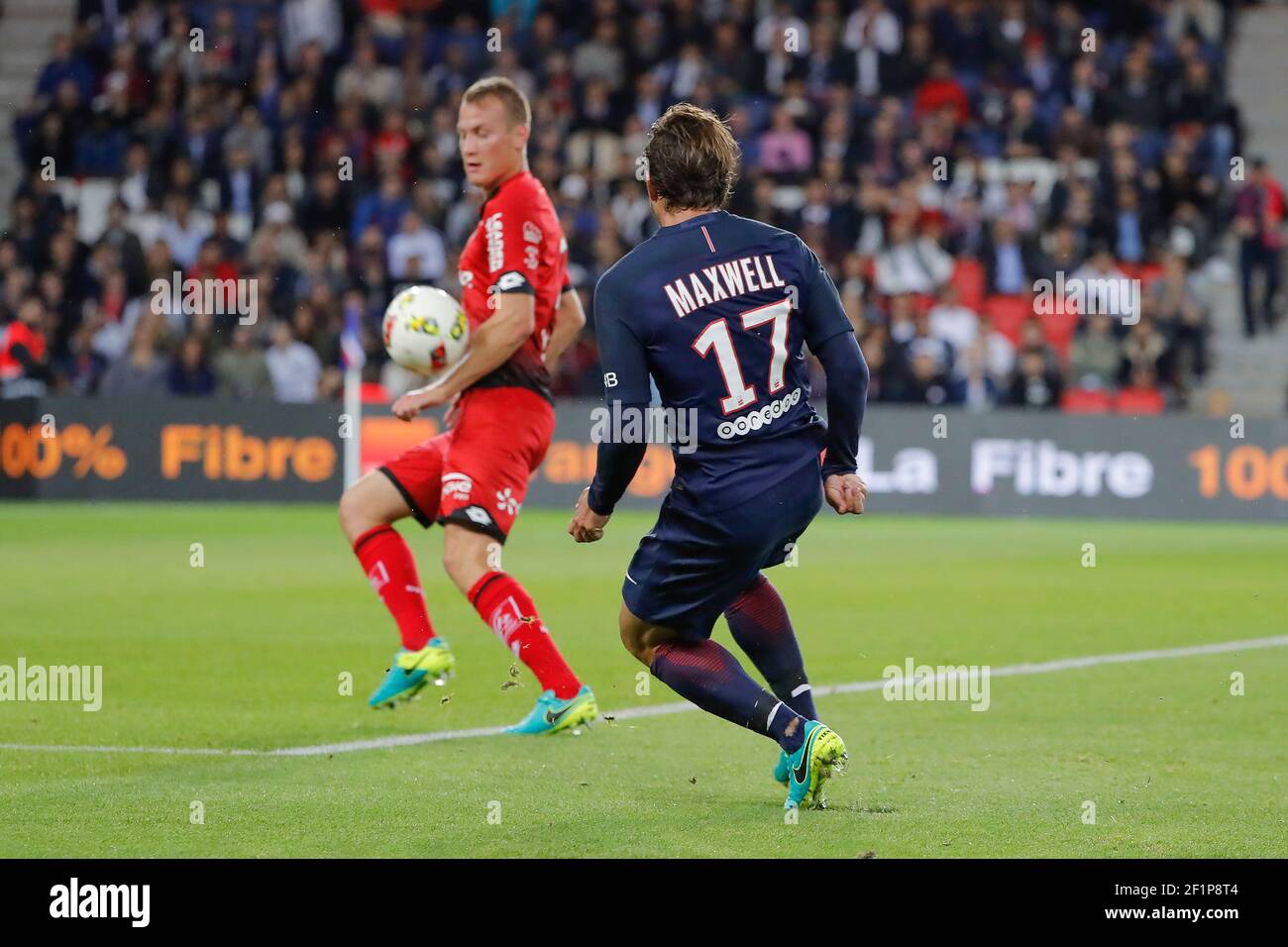 Maxwell Scherrer Cabelino Andrade (psg) kicked the ball on Adam LANG (Dijon Football  Cote-D'Or) during the French Championship Ligue 1, french first league, football  match between Paris Saint-Germain and Dijon FCO on