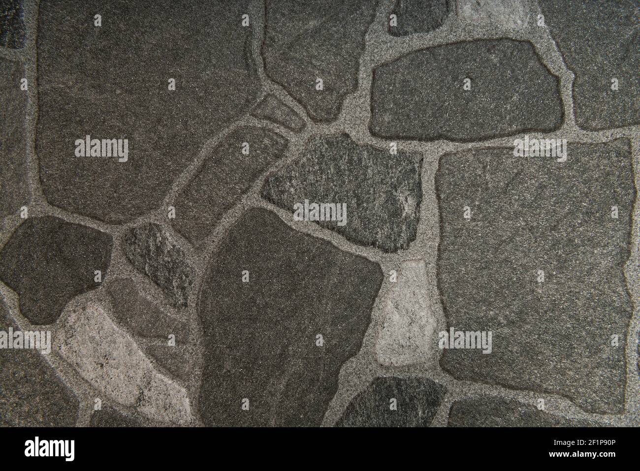 grey, rough stones textured flooring background, top view Stock Photo