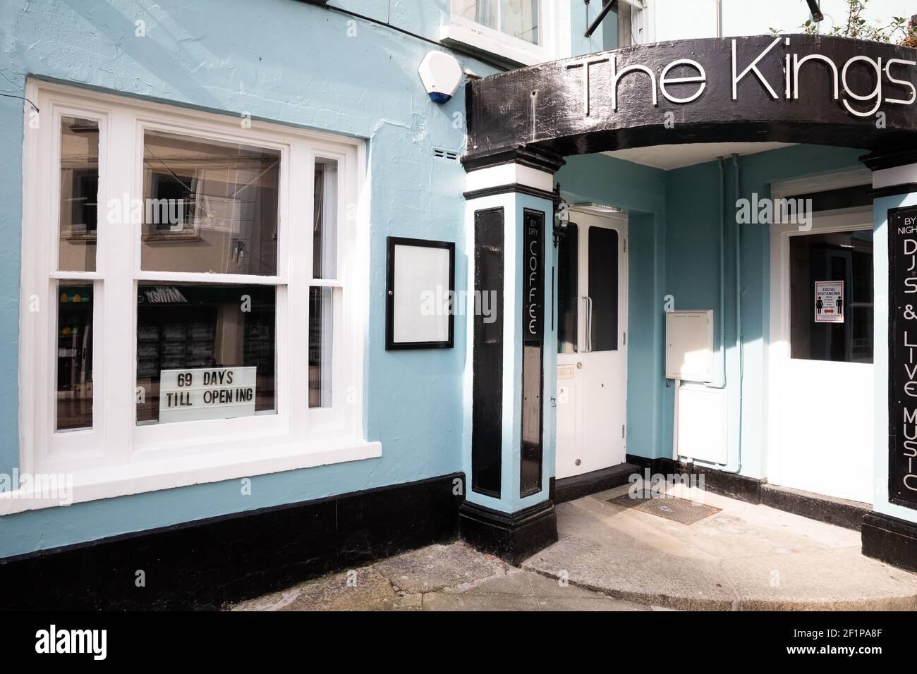 Falmouth,Cornwall,UK,9th March 2021,Deserted Falmouth during Lockdown. The Kings Bar has a sign in the window counting down 69 days till re opening .Credit Keith Larby/Alamy Live News Stock Photo