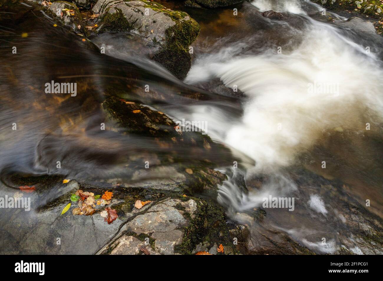 Aira Force waterfalls in autumn, Lake District, Cumbria, England Stock Photo