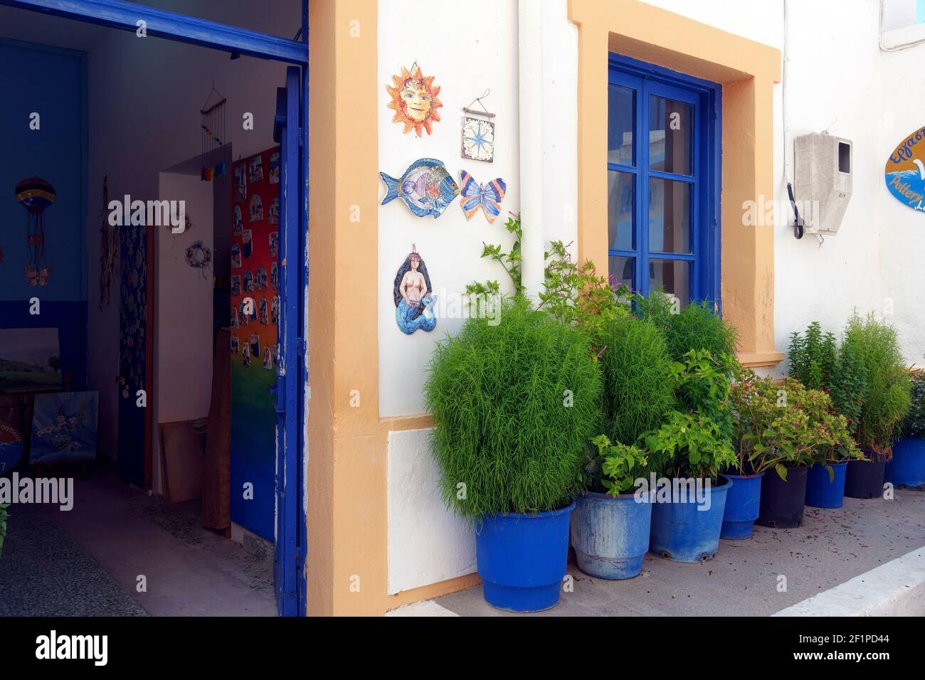 plants outside a charming house in Kefalos old town on the Greek island of Kos Stock Photo