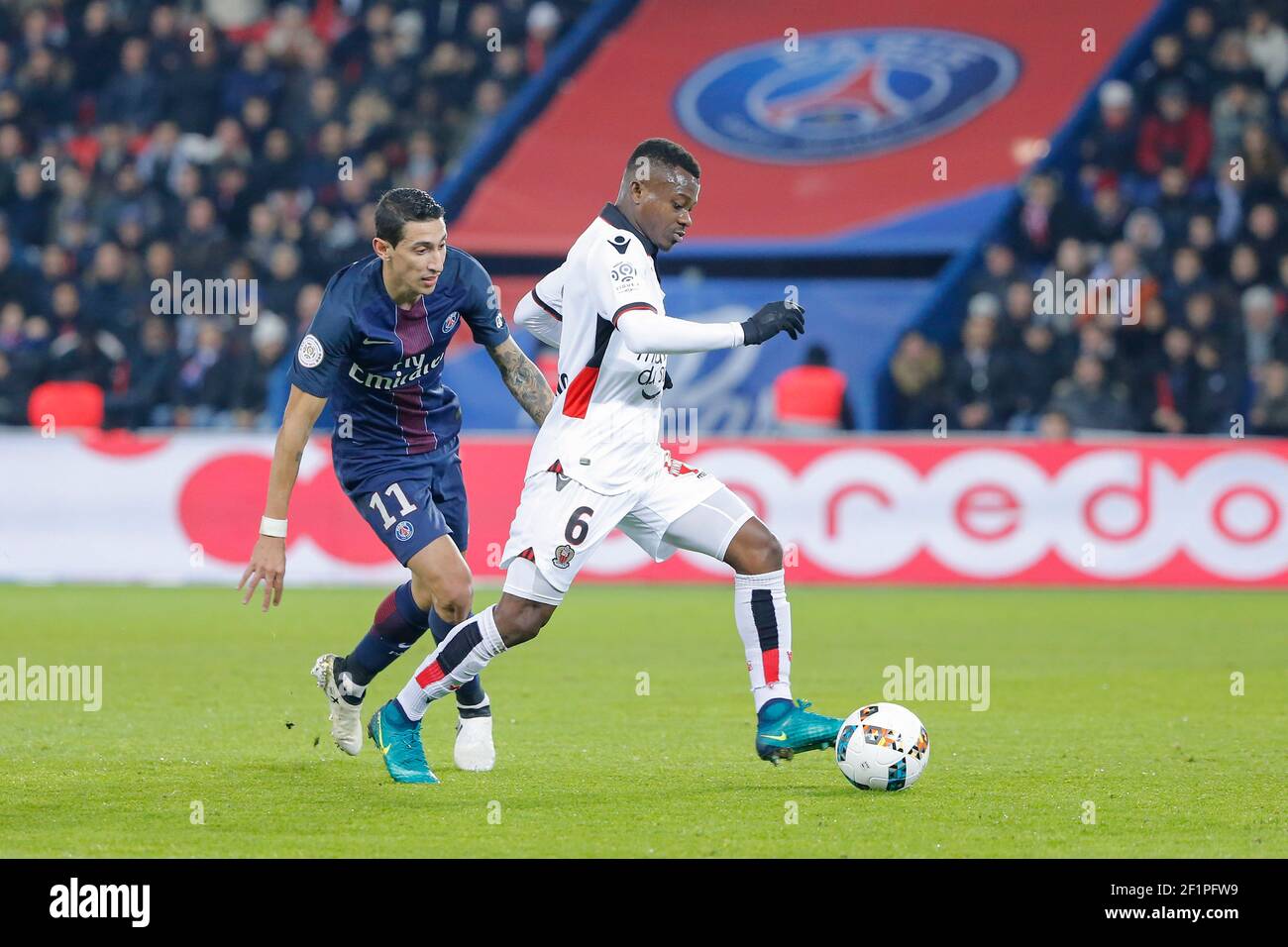 Angel Di Maria (psg) and Jean Michael Seri (Olympique Gymnaste Club Nice  Cote d Azur - OGC Nice) during the French Championship Ligue 1 football  match between Paris Saint-Germain and OGC Nice