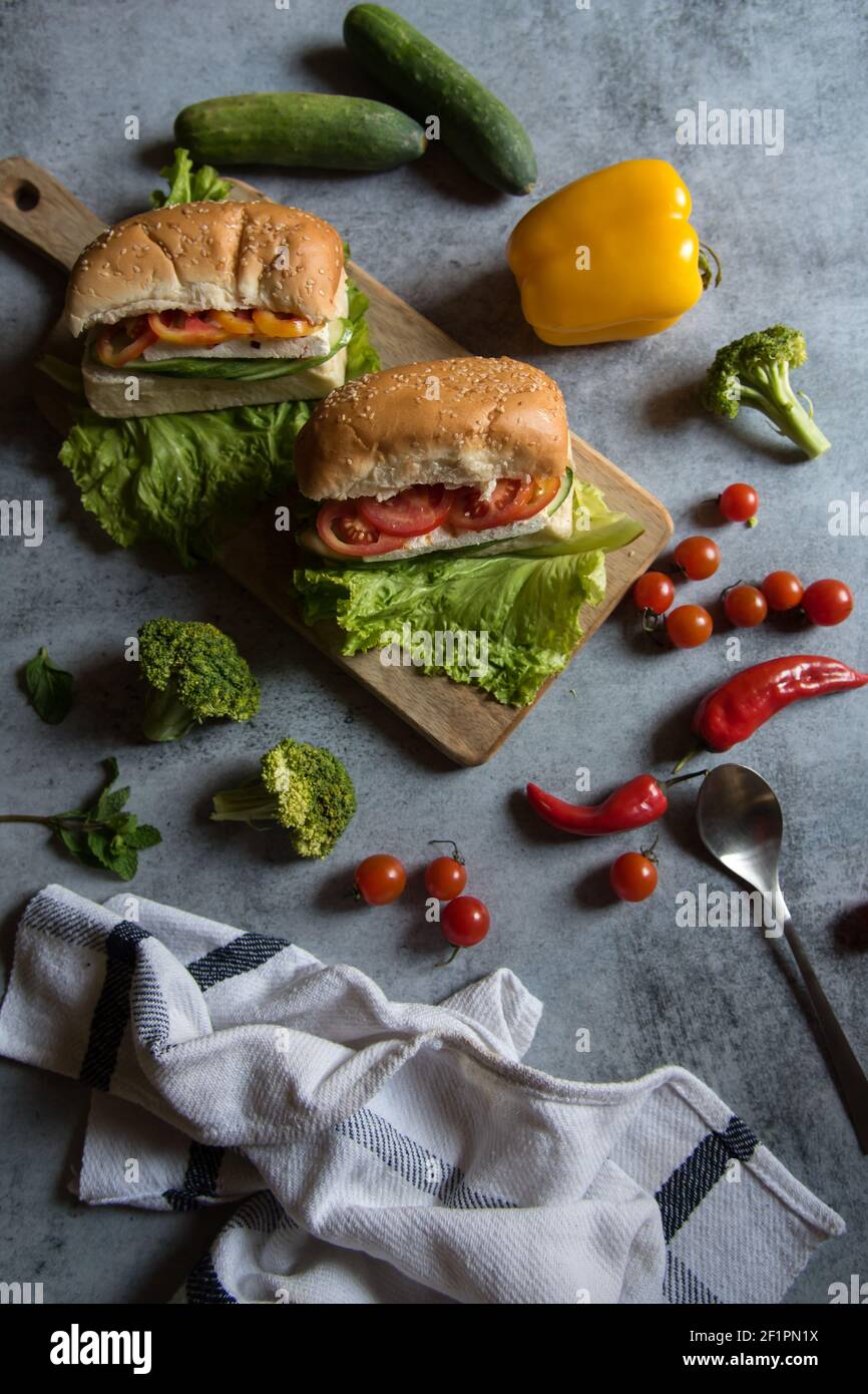 Continental snacks sandwich prepared with raw food ingredients. Top view, selective focus. Stock Photo