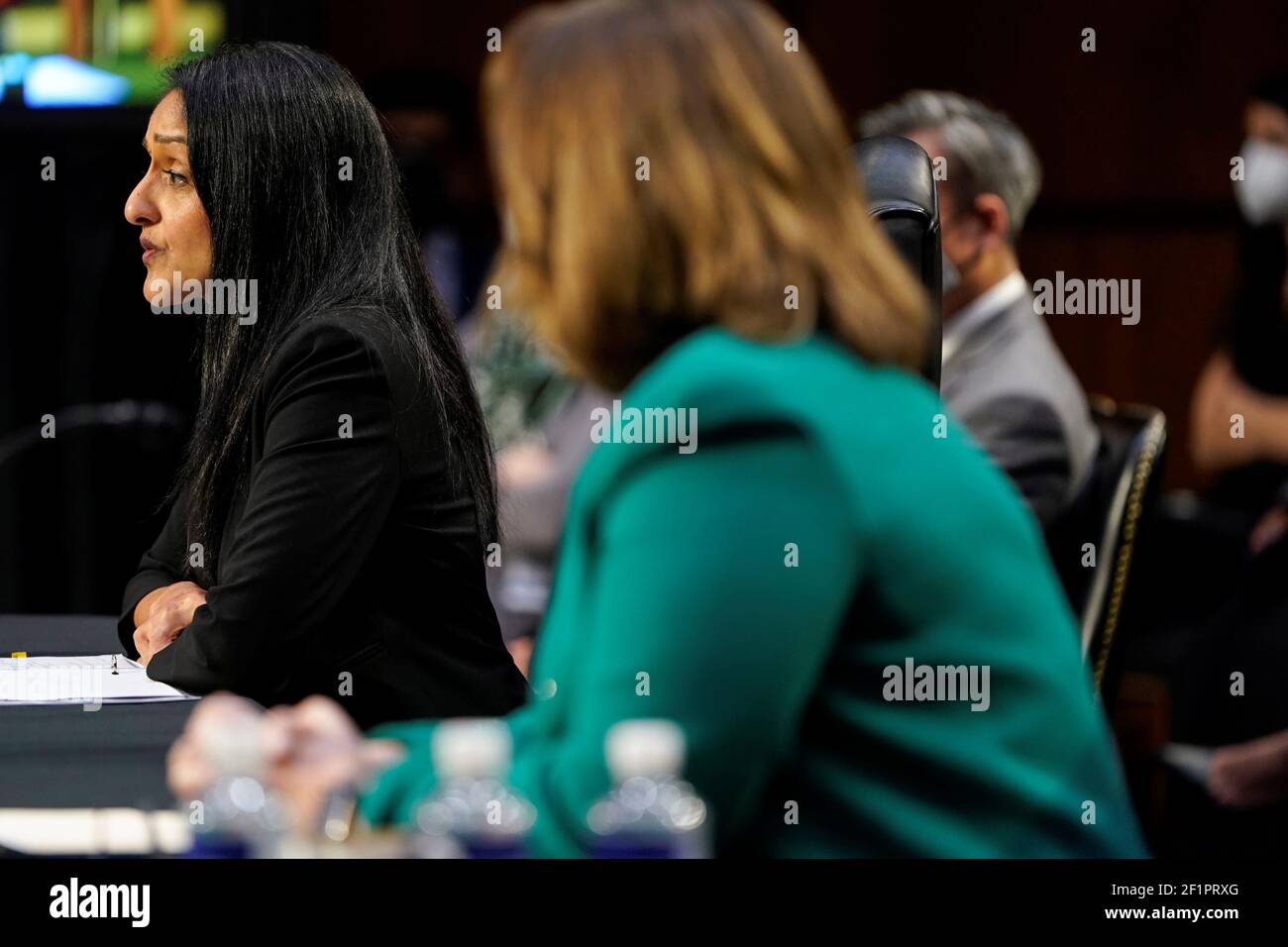 Nominee to be Associate Attorney General Vanita Gupta testifies as Nominee to be Deputy Attorney General Lisa Monaco listens during their confirmation hearing before the Senate Judiciary Committee on Capitol Hill in Washington, U.S., March 9, 2021. REUTERS/Joshua Roberts Stock Photo