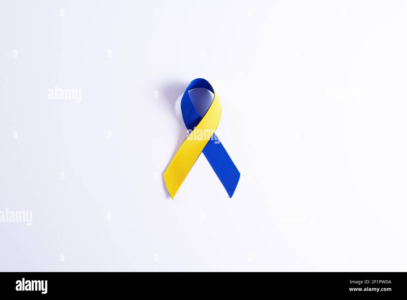 Down syndrome day with blue yellow ribbon awareness support patient ...