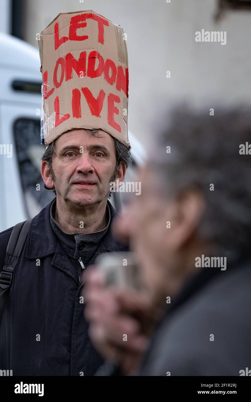 Coronavirus: Police break up and make arrests during an attempted anti-lockdown event of 20-30 protesters on Richmond Green in south east London, UK. Stock Photo