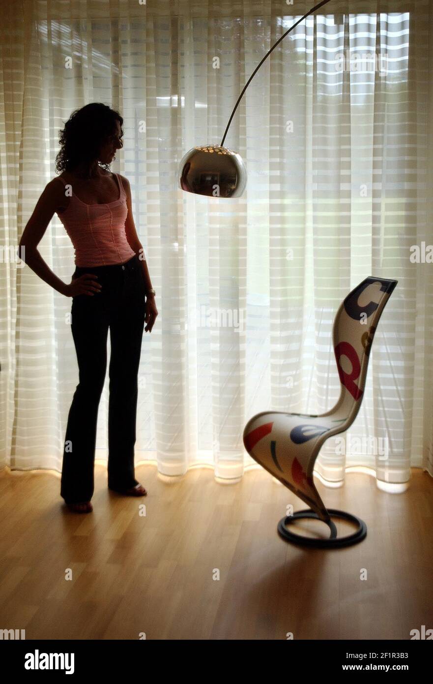 ANETTE CHAPLIN WITH A TOM DIXON CAPPELLINI S CHAIR AND AN ARCO LIGHT BY CASTIGLIONI MADE BY FLOSS.7.7.04 PILSTON Stock Photo Alamy